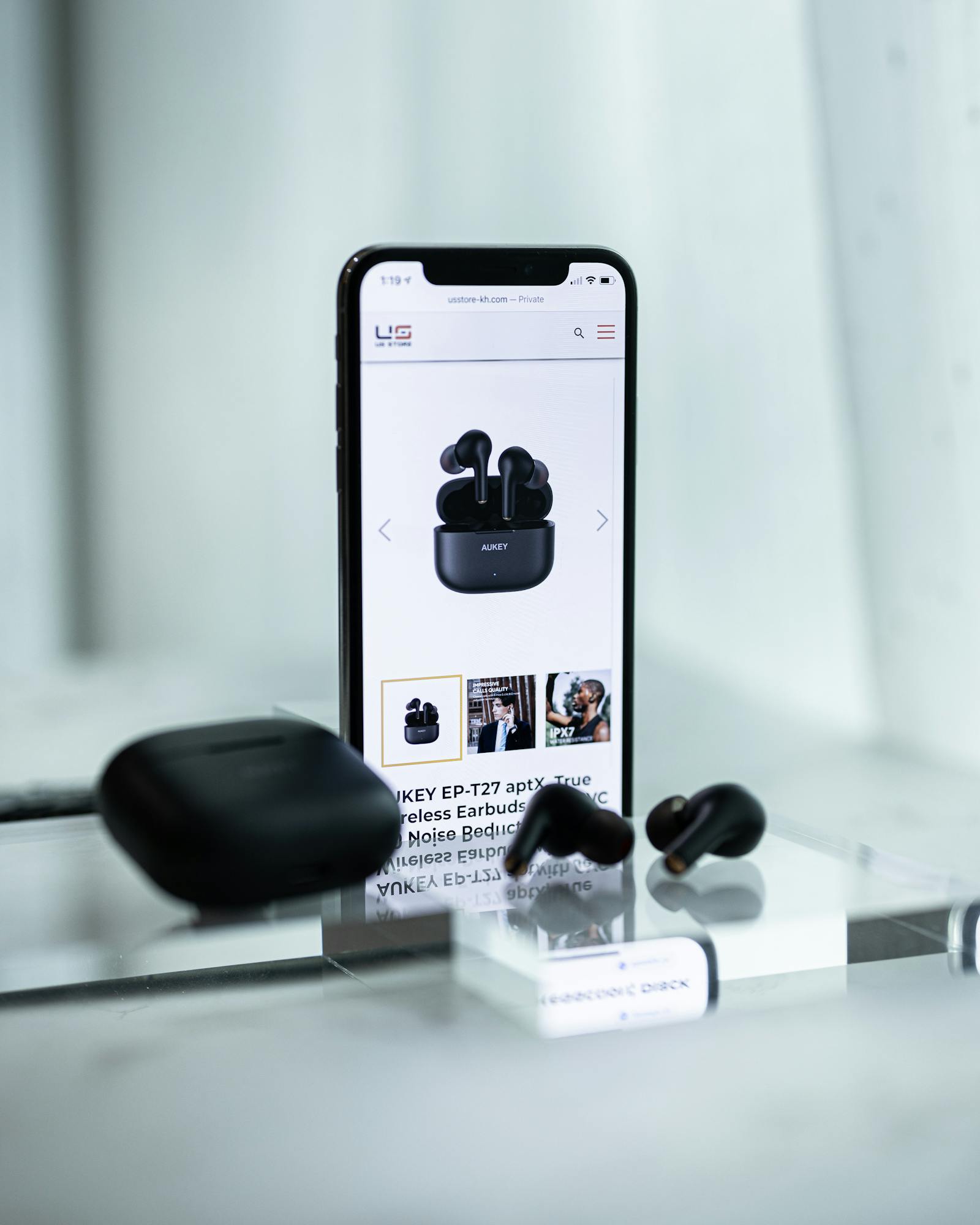 Real earbuds in a close-up lifestyle scene